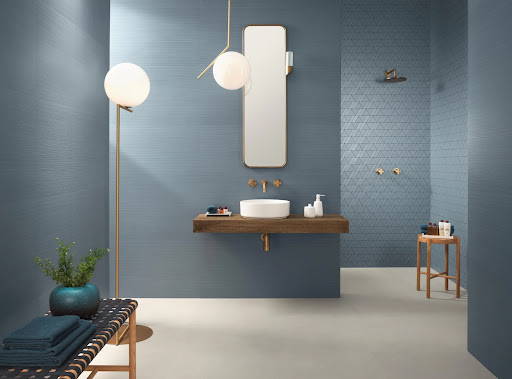 Soothing blue tile continues to be popular for bathrooms because of its ability to promote relaxation and wellness.